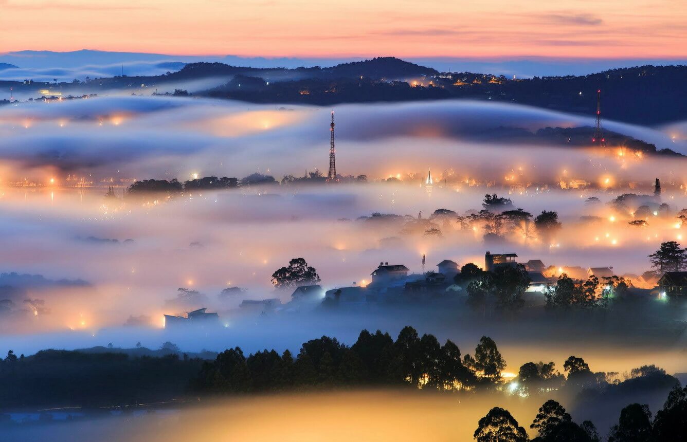 Da Lat city with clouds and mountains